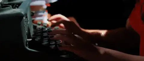 GIF: Hände tippen schnell auf einer Schreibmaschine